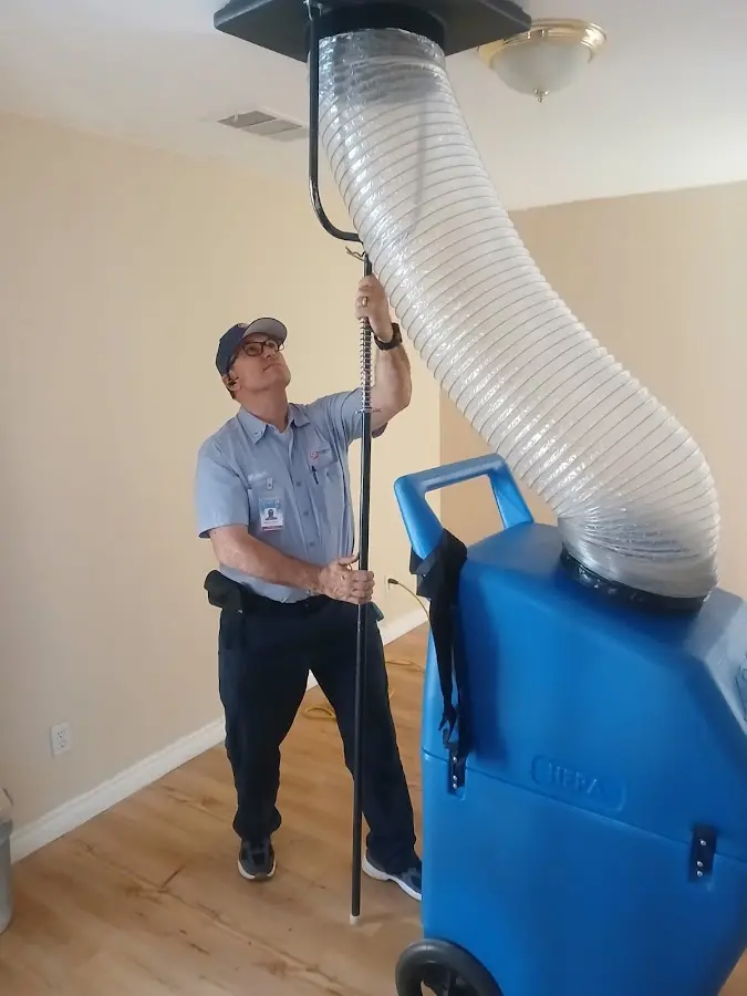 HVAC Installation technician using HEPA equipment in Socorro